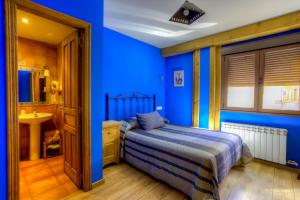 Postel nebo postele na pokoji v ubytování Hostal Rural La Tintoreria + 37 fotografií