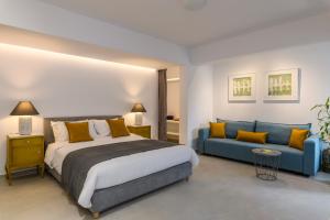 Posteľ alebo postele v izbe v ubytovaní Blueisla GREY Studio Town Mykonos