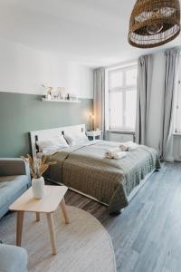 Postel nebo postele na pokoji v ubytování Modernes, gemütliches Apartment mitten in Leipzig