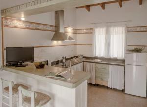 Kuchyň nebo kuchyňský kout v ubytování Viviendas Ferrer - Formentera Break