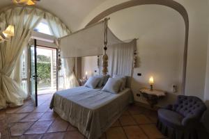 Postel nebo postele na pokoji v ubytování Casa Raiola Ercolano Luxury Rooms & Spa