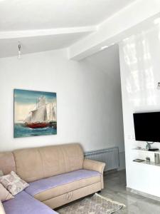 Μια τηλεόραση ή/και κέντρο ψυχαγωγίας στο Apartment Andjela