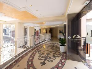 a staircase in a building with a lobby at Hotel Golden Ina - All Inclusive - Beachfront in Sunny Beach +59 photos