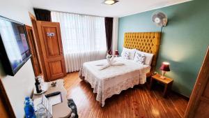 Postel nebo postele na pokoji v ubytování Casa Joaquin Boutique Hotel