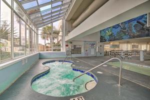 The swimming pool at or close to Oceanfront Oasis with Deck and Resort Beach Access!
