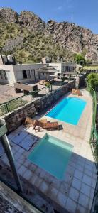 - Vistas a 2 piscinas del patio en Cabañas Cerro Colorado en Valle Grande