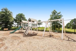 a park with a playground with a slide at Bear Trap Dunes --- 79C October Glory Ave in Ocean View