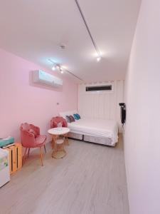 Postel nebo postele na pokoji v ubytování SHOW Liquiu B&B