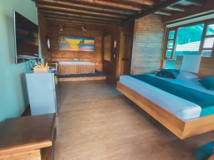 Letto o letti in una camera di Sotavento Cabañas