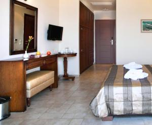 Postel nebo postele na pokoji v ubytování Hotel Tesoro