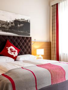 Łóżko lub łóżka w pokoju w obiekcie Hotel Villa Carlton - Adults Only