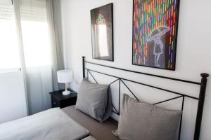 A bed or beds in a room at Apt. Aire de Mar - Costa del Sol