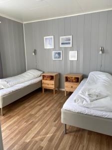 A bed or beds in a room at In the heart of the Lyngen alps, Holmen i Lyngen
