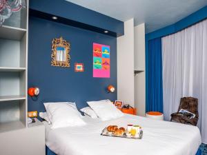 Postel nebo postele na pokoji v ubytování Hotel Gabriel