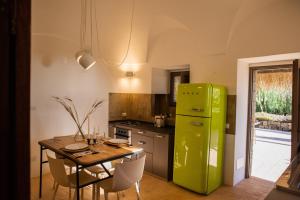 Nhà bếp/bếp nhỏ tại Dammuso Oltremare - Appartamento Lantana