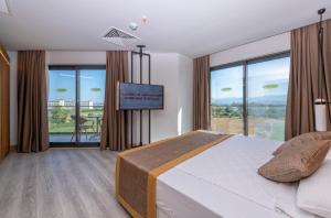 Postel nebo postele na pokoji v ubytování Akadia Luxury Sorgun - Adults Only 16 Plus + 36 fotografií