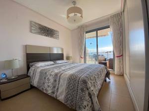 A bed or beds in a room at Plaza Mayor Még 25 kép