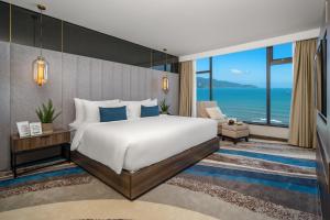 Uma cama ou camas num quarto em Minh Toan SAFI Ocean Hotel