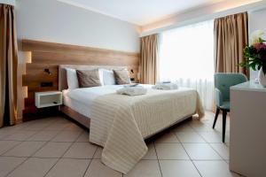 Katil atau katil-katil dalam bilik di Hotel Polo