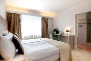 Katil atau katil-katil dalam bilik di Hotel Polo