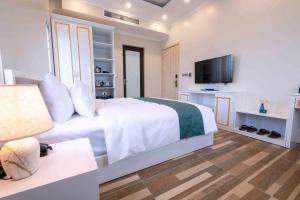 TV a/nebo společenská místnost v ubytování Minh Long Hotel