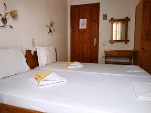 Postel nebo postele na pokoji v ubytování Pension Nikolas
