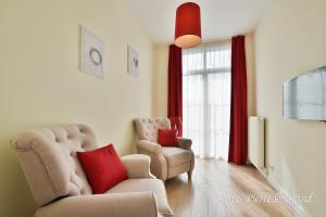 Istumisnurk majutusasutuses Hôtel l'Ecrin d'Ô