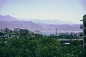 a city with a view of the water and buildings at Sea and Soul in Eilat