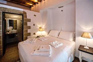 A bed or beds in a room at Sclopa The Laography Project