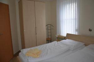 Postel nebo postele na pokoji v ubytování Wohnung 3d