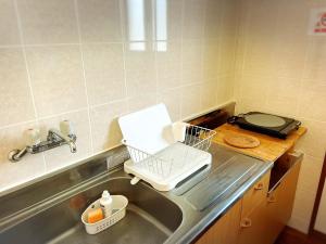 Fotografie z fotogalerie ubytování Yomitan Ocean View Apartment 401 v destinaci Jima
