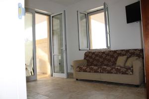 A seating area at Ricciolandia Suites