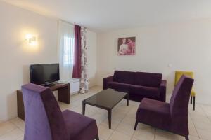 TV a/nebo společenská místnost v ubytování Villa Bellagio Amboise by Popinns
