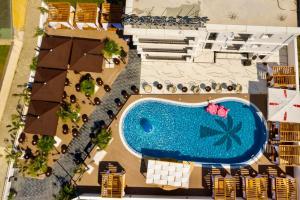 an aerial view of a pool at a resort at NOLEA Boutique Hotel in Velipojë
