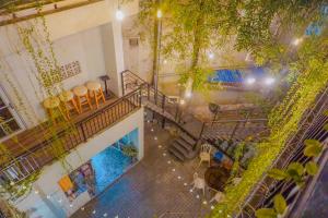 an overhead view of a building with a swimming pool at The Bay - Ha Long Homestay in Ha Long