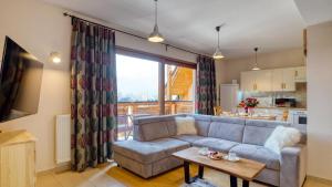 Kuchyňa alebo kuchynka v ubytovaní Apartament Sywarne Deluxe