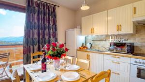 Kuchyňa alebo kuchynka v ubytovaní Apartament Sywarne Deluxe