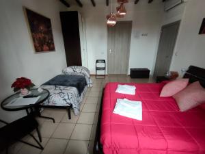 Postel nebo postele na pokoji v ubytování B&B Pierilu'