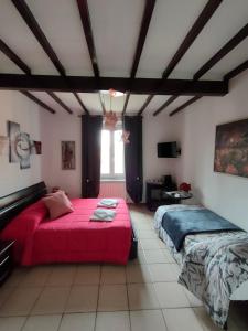 Postel nebo postele na pokoji v ubytování B&B Pierilu'