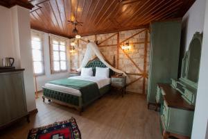 Krevet ili kreveti u jedinici u okviru objekta White Garden Hotel-Adult Only