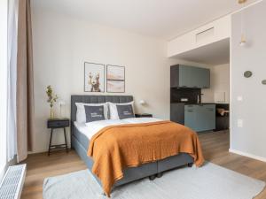 Ένα ή περισσότερα κρεβάτια σε δωμάτιο στο Limehome Berlin Müllerstraße - Digital Access