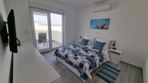 Ένα ή περισσότερα κρεβάτια σε δωμάτιο στο Simuni Delight