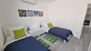 Ένα ή περισσότερα κρεβάτια σε δωμάτιο στο Simuni Delight