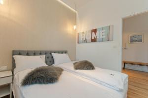 Posteľ alebo postele v izbe v ubytovaní Imperial Apartments Helska