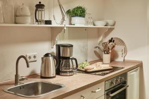 Kuchyň nebo kuchyňský kout v ubytování Gut Hohenstein - Platanenappartment + 8 fotografií