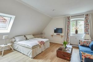 Postel nebo postele na pokoji v ubytování Gut Hohenstein - Platanenappartment