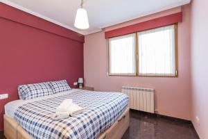 Posteľ alebo postele v izbe v ubytovaní Confortable apartamento en Lekeitio