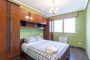 Posteľ alebo postele v izbe v ubytovaní Confortable apartamento en Lekeitio