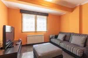 Televízia a/alebo spoločenská miestnosť v ubytovaní Confortable apartamento en Lekeitio