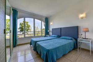 Postel nebo postele na pokoji v ubytování Villa Bellavista Calpe